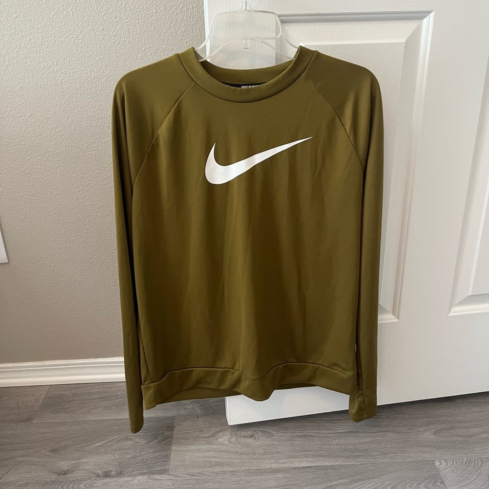 Dry fit Nike running long sleeve shirt. Like new condition. Medium, loose fit.